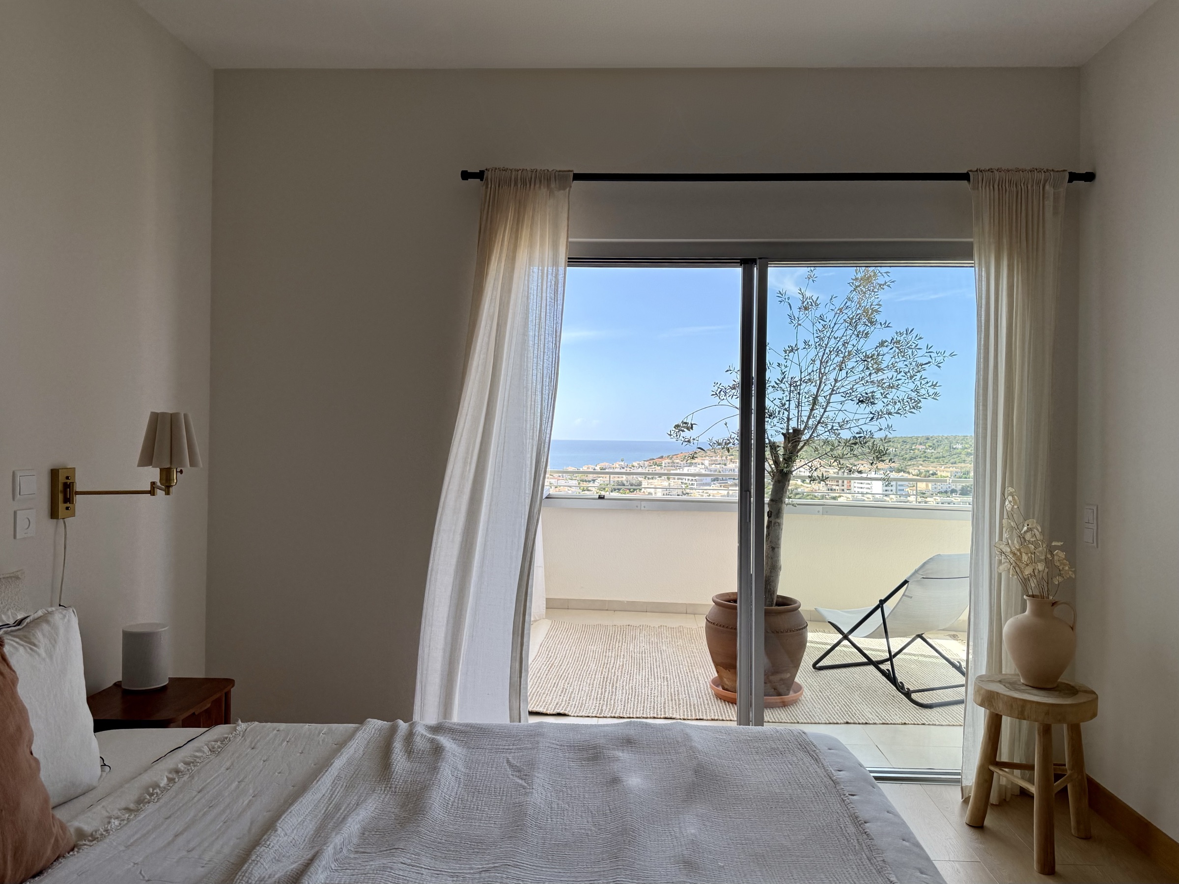 Primary bedroom opening to the terrace