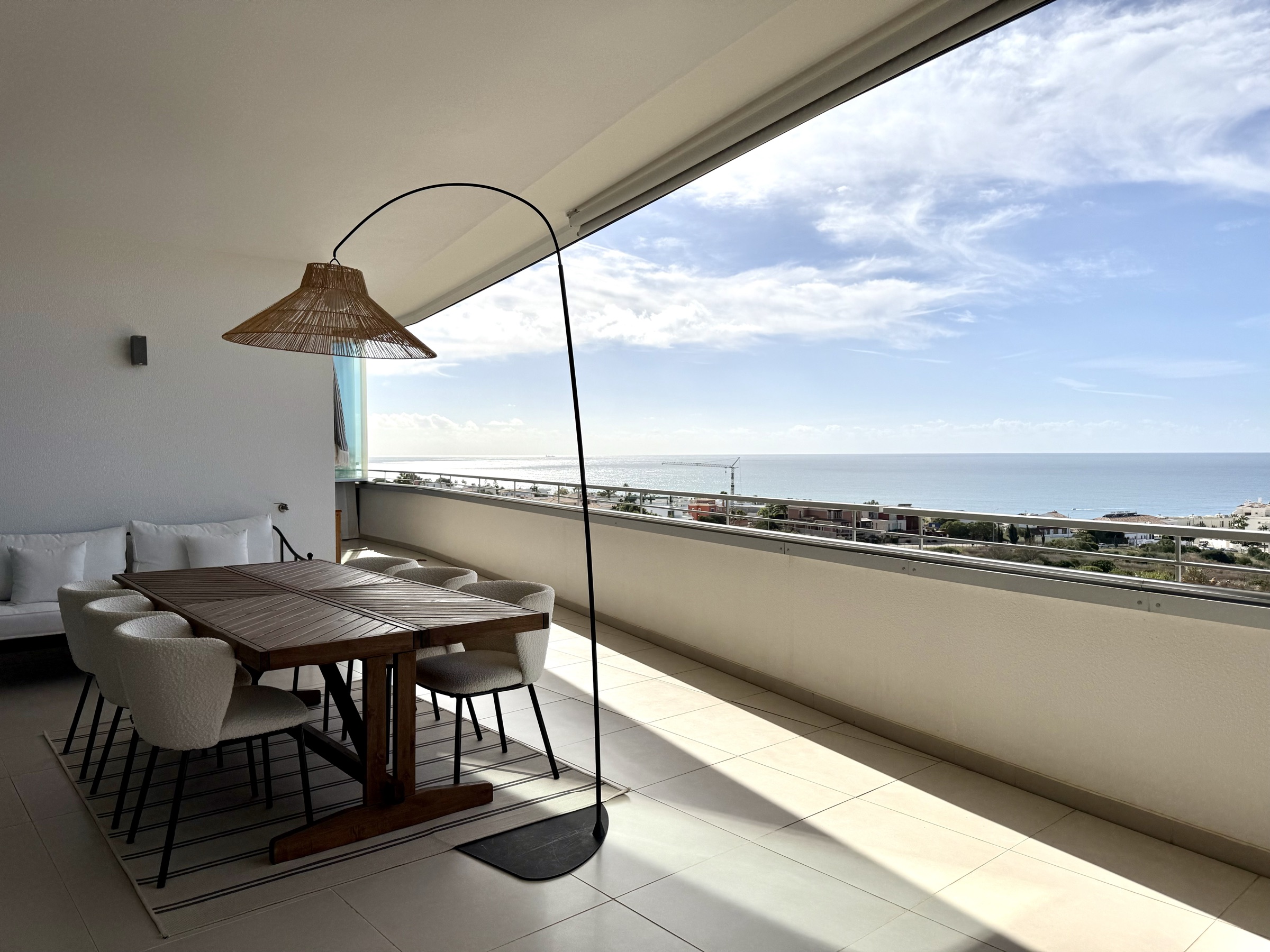 Covered terrace dining area overlooking the Atlantic