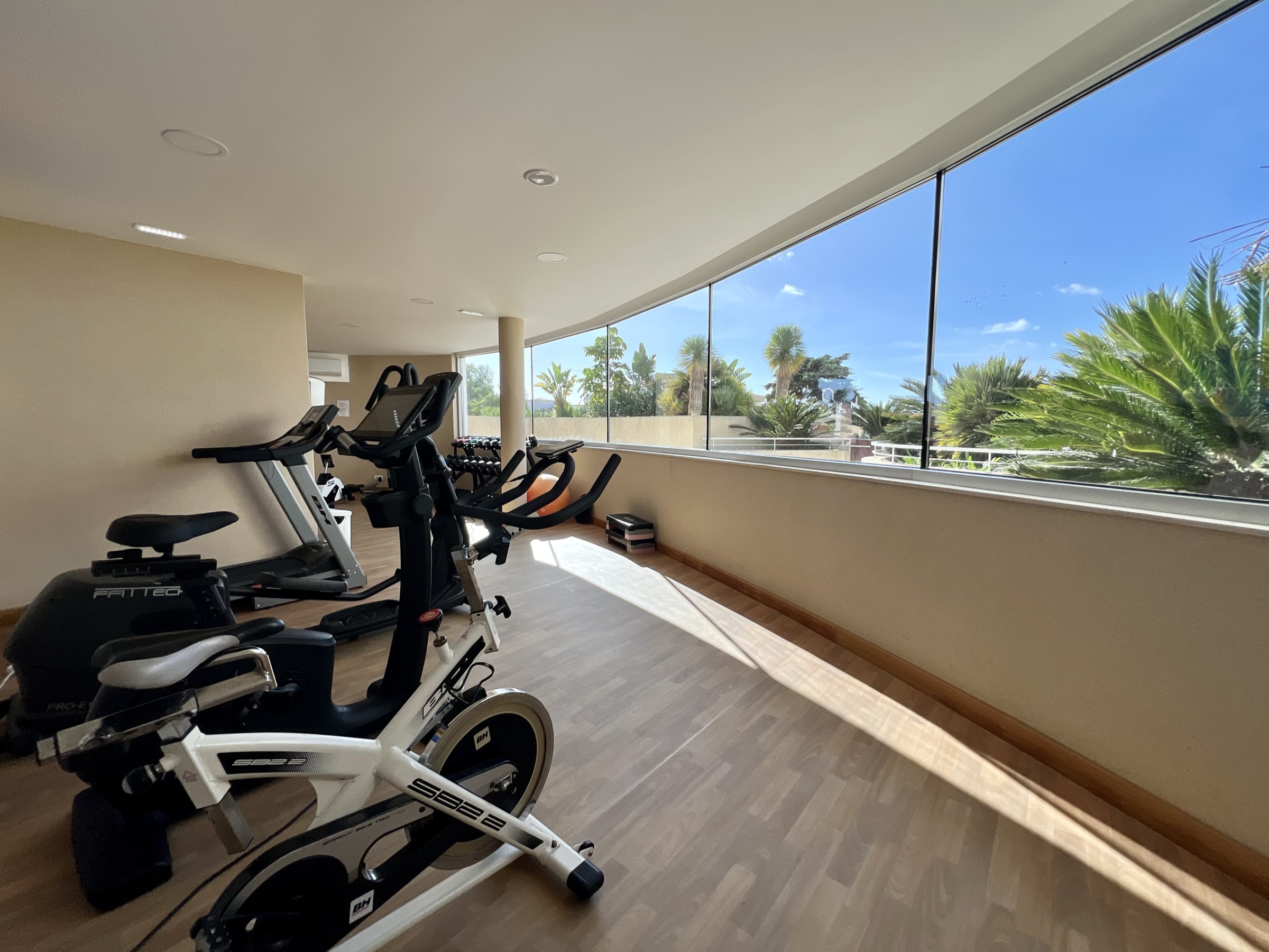 Residents' gym with garden view